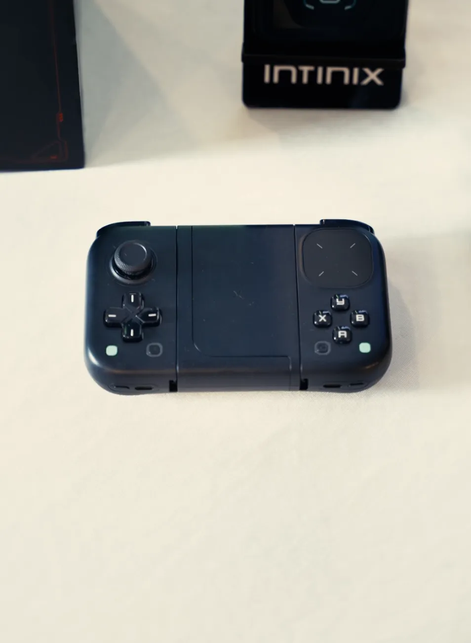 The Infinix GT NX Controller on display at the GT 50 Pro launch event
